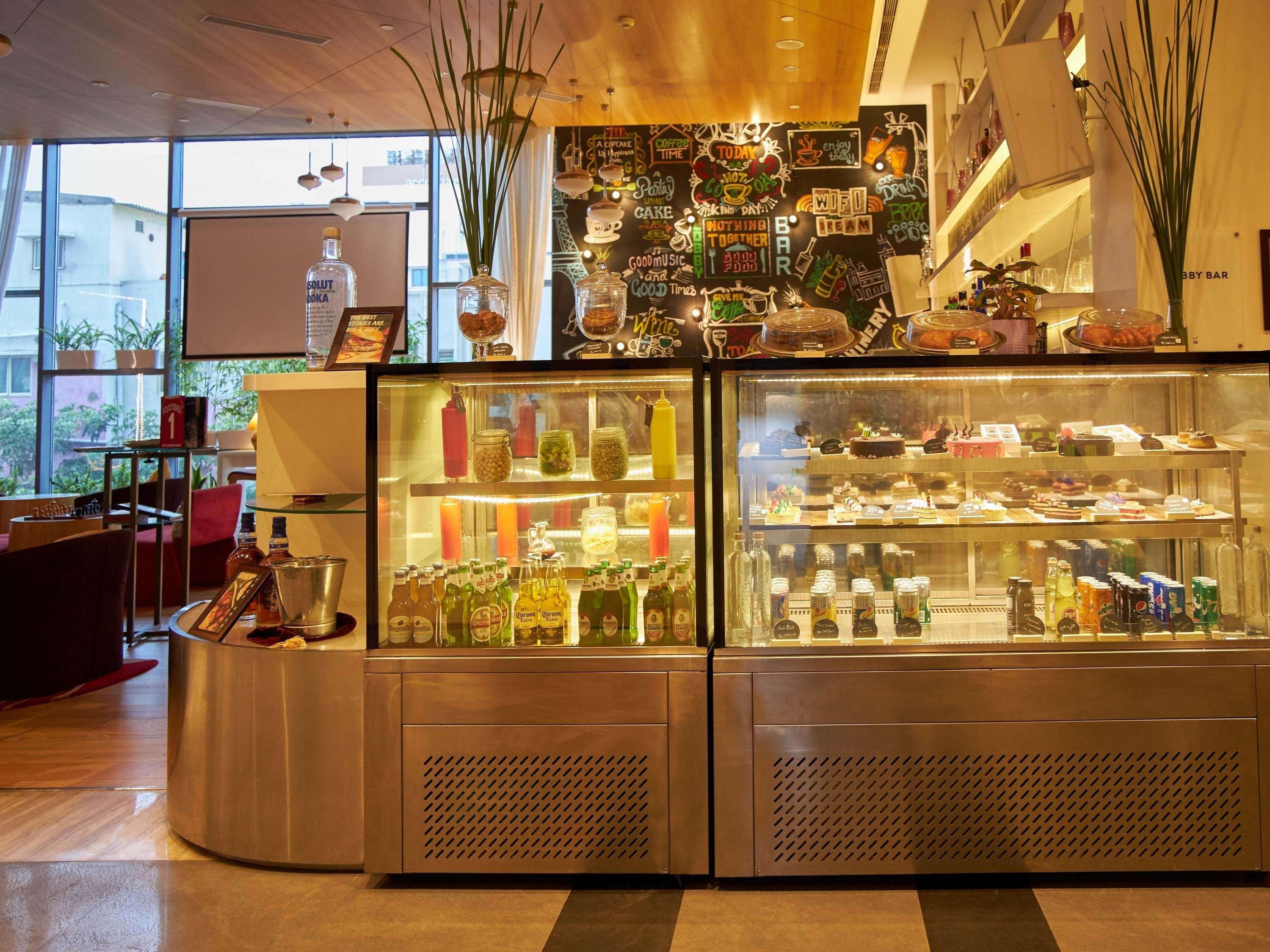 Novotel Chennai Sipcot Екстер'єр фото The pastry counter at the lobby